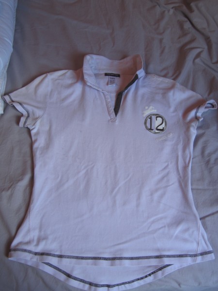 polo manche courte fouganza, rose et gris taille 40, presque pas port, trs bon tat.